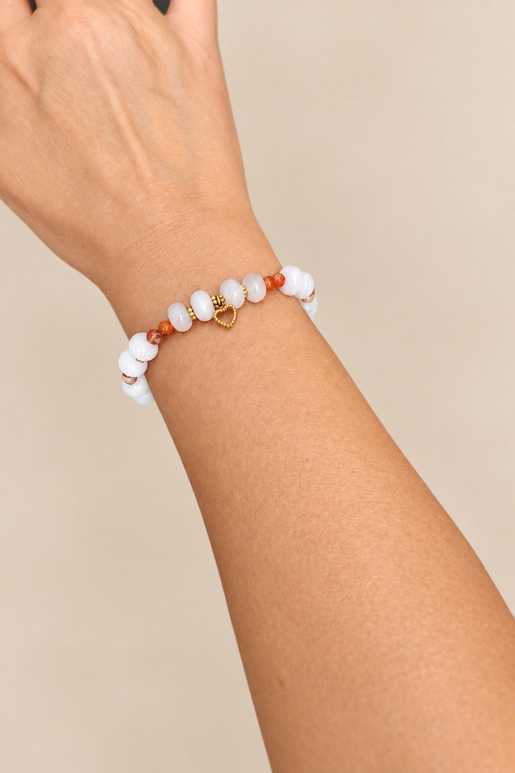 Bracelet en quartz rose et cœur évidé doré 18K